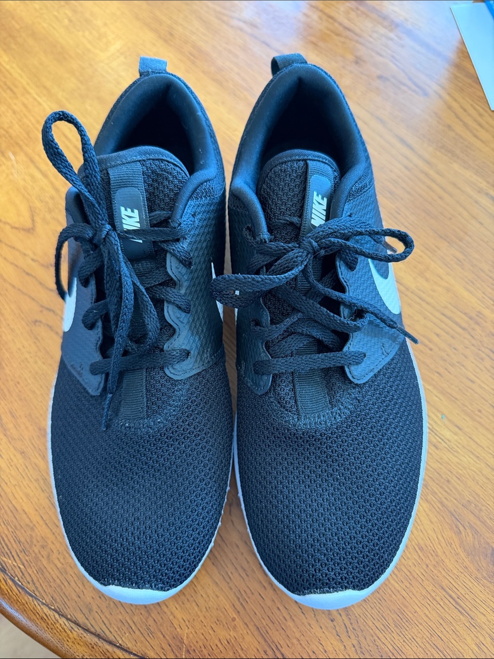 Nike Black Athletic Running Shoes with White Swoosh